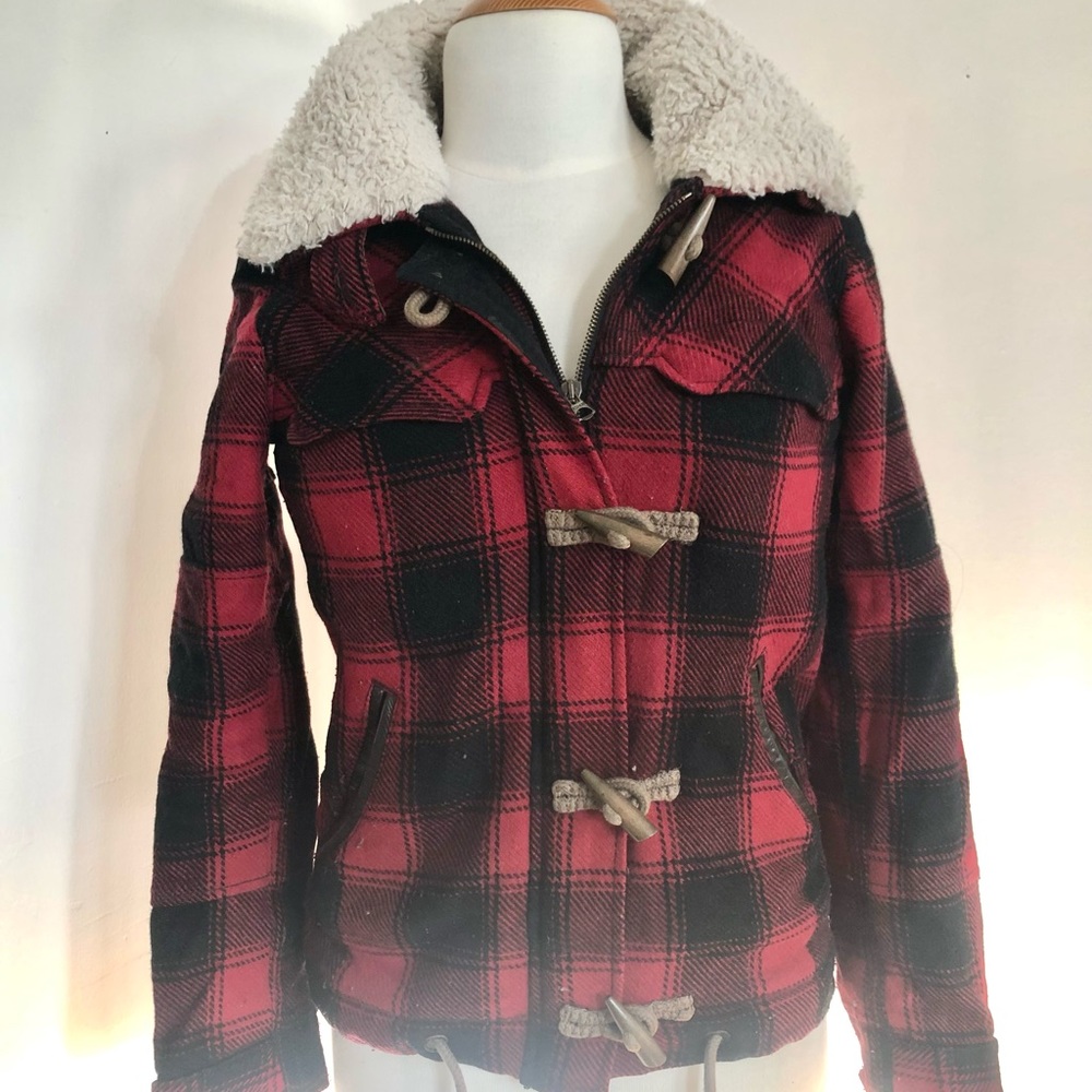 Levi’s red plaid trucker jacket.